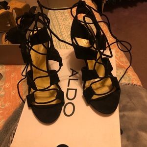 Worn once; aldo black suede tie-up wedge size 7.5